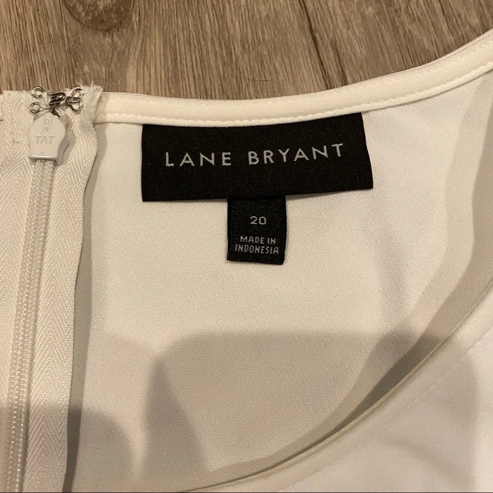 Off-White Peplum Blouse - Picture 3 of 3